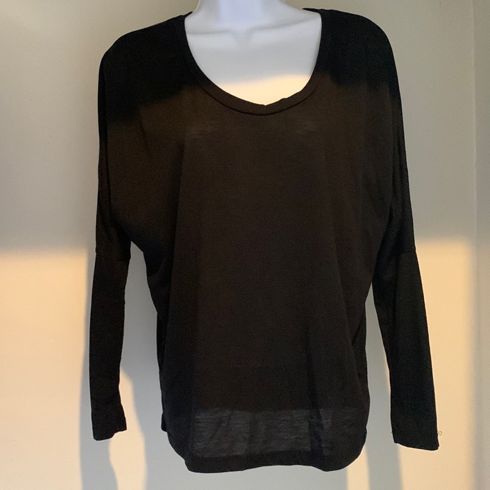 Forever 21 Black top.  Super cute.  Sleeves are fitted from elbow to wrist.  S/P